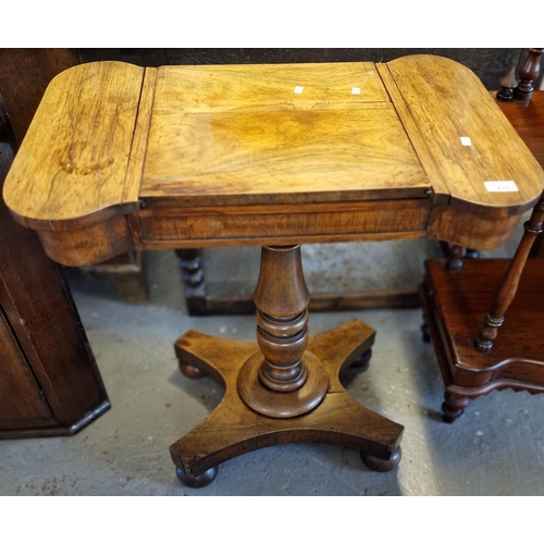 477 - 19th century rosewood games table with sliding mechanism revealing gaming board, flanked by two hing... 