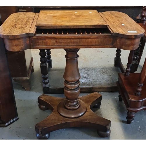 477 - 19th century rosewood games table with sliding mechanism revealing gaming board, flanked by two hing... 