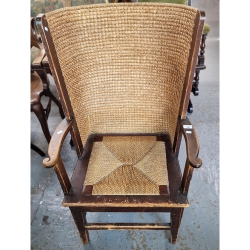 481 - Scottish Orkney beech frame open arm lambing chair with curved woven straw back and rush seat. Stand... 