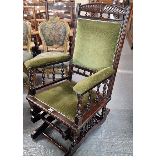 483 - Early 20th century stained and carved American style spring rocking armchair. (B.P. 21% + VAT)