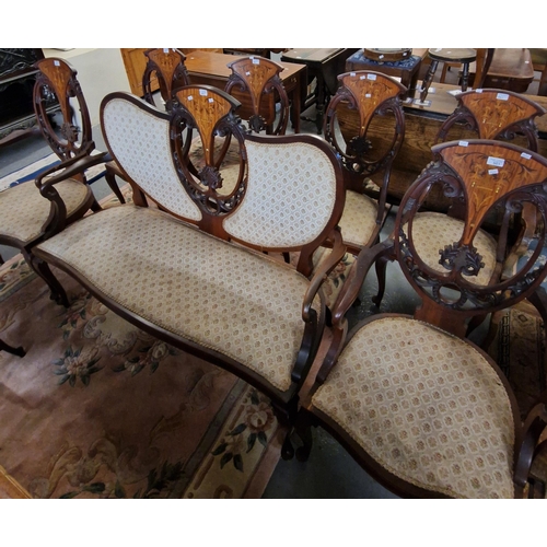 501 - Edwardian mahogany inlaid and mixed woods parlour suite comprising: large two seater sofa, pair of c... 