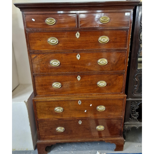 504 - George III mahogany chest on chest, the moulded cornice above an arrangement on two short and three ... 