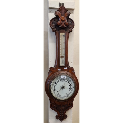 506 - Early 20th century carved oak banjo aneroid barometer.  (B.P. 21% + VAT)