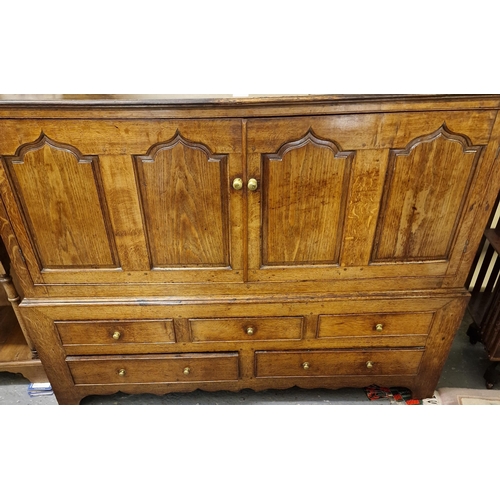 518 - 18th century Cardiganshire oak mule chest, with four moulded and pointed ogee panels above an arrang... 