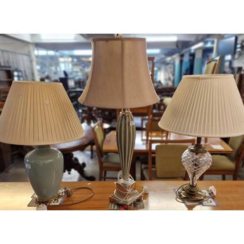 522 - Collection of modern table lamps with silvered, brass and glass finish, with shades. (3)  (B.P. 21% ... 