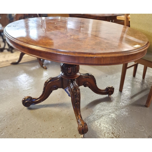 524 - Victorian burr walnut loo table on ornate carved and moulded quatrefoil base.  (B.P. 21% + VAT)