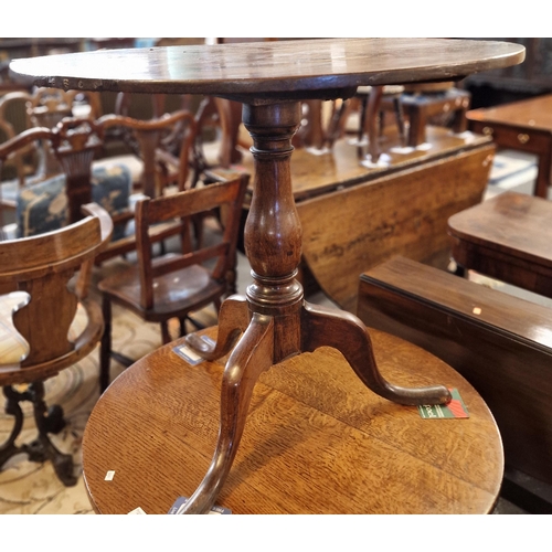 529 - 19th century oak tripod table. 79cm diameter approx.  (B.P. 21% + VAT)