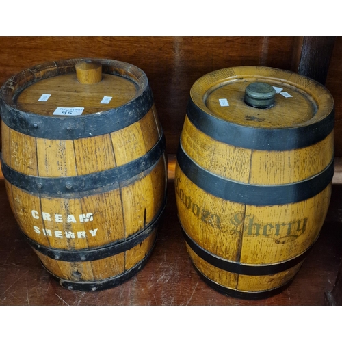 95 - Two vintage oak coopered metal banded Sherry barrels. 34cm high approx.  (B.P. 21% + VAT)