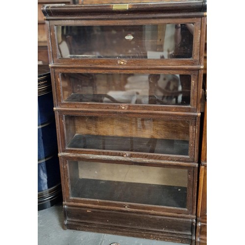 473 - Early 20th century oak Globe Wernicke four sectional bookcase with presentation plaque dated 1927. P... 