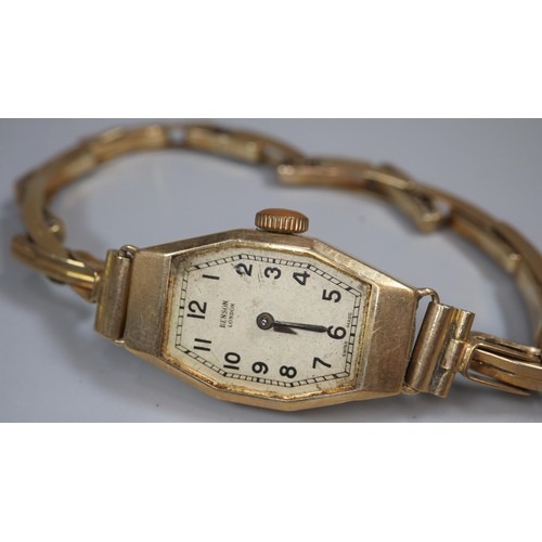 306 - Benson 9ct gold lozenge shaped ladies' wristwatch with Arabic numerals and expanding 9ct gold bracel... 