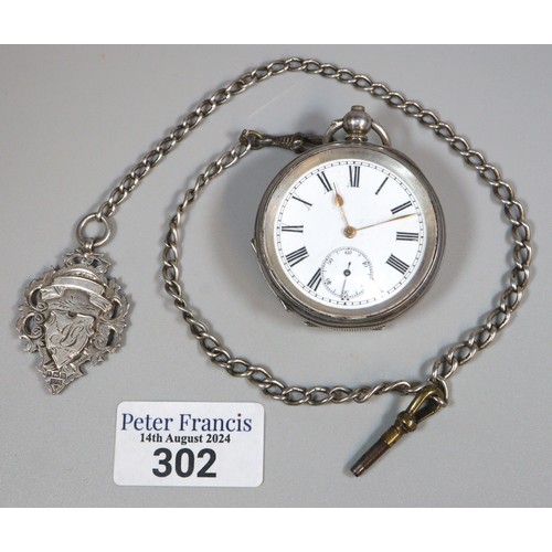 302 - Silver open faced key wind pocket watch with Roman numerals and seconds dial on a long silver curb l... 