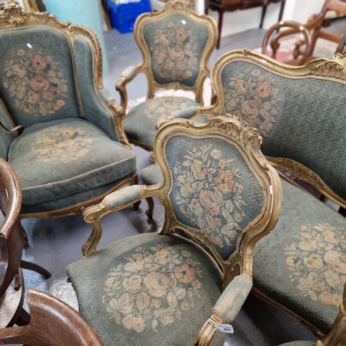 19th century French Louis XV rococo style carved wood and gesso framed ten piece parlour suite comprising: two seater canape sofa with open arms, wing easy chair with loose cushion, six single side chairs and two elbow chairs, all with appearing original matching tapestry upholstery, on front and rear cabriole legs with scroll feet. Provenance: Large Pembrokeshire Country House attic. (10)  (B.P. 21% + VAT)