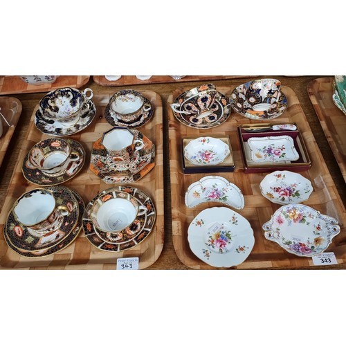 343 - Two trays of Royal Crown Derby porcelain items in 'Imari' design to include: cabinet cups and saucer... 