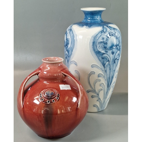 1 - William Moorcroft three handled Flamminian vase with raised Art Nouveau roundels. 16cm high approx. ... 