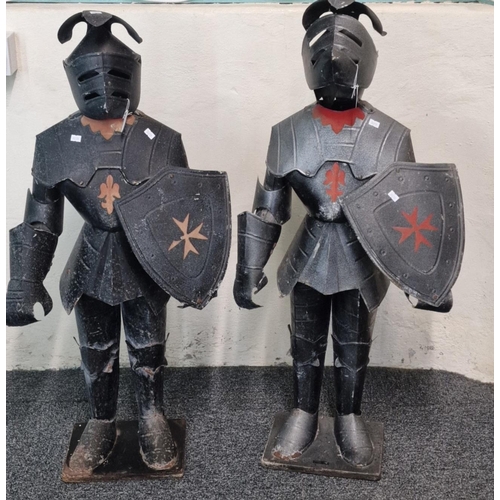 101 - Pair of novelty Knights in tin armour. Each 105cm high approx. (2) (B.P. 21% + VAT)