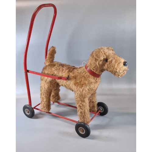 104 - Lines Brothers Ireland Ltd. pull along terrier dog toy on tubular frame and wheels. (B.P. 21% + VAT)