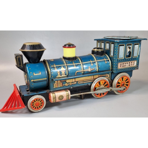 124 - Vintage battery operated tin plate locomotive marked 'Western'. (B.P. 21% + VAT)