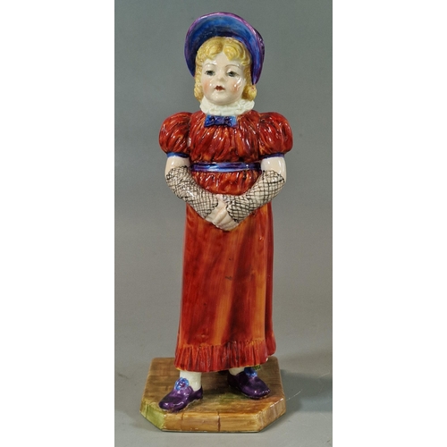 2 - Royal Worcester porcelain Kate Greenaway figurine, girl in bonnet with fingerless gloves. Puce print... 