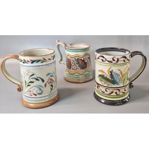 23 - Three Denby stoneware tankards, hand-painted with Autumnal leaves and foliage. (3) (B.P. 21% + VAT)