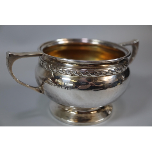 234 - George V silver four piece beaten finish tea service, by Albert Edward Jones of Birmingham, various ... 