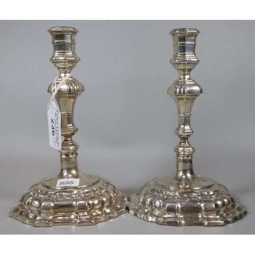 236 - Pair of George II style white metal (probably continental silver) knopped candlesticks with fluted a... 