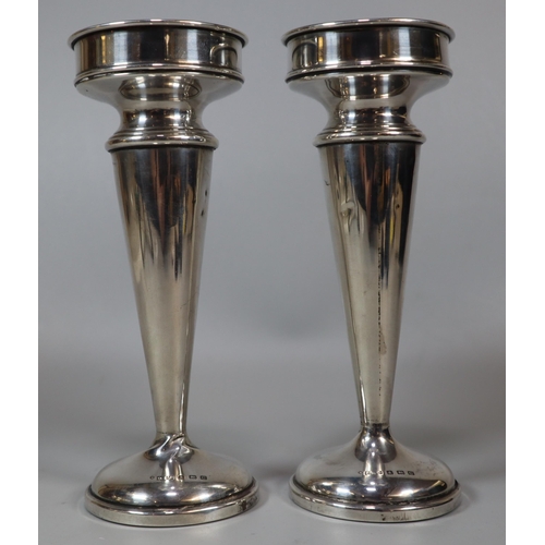 241 - Pair of George V silver vase shaped candlesticks on loaded bases, by Oldfield Ltd, Birmingham 1927. ... 