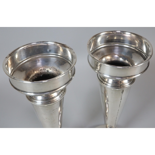 241 - Pair of George V silver vase shaped candlesticks on loaded bases, by Oldfield Ltd, Birmingham 1927. ... 