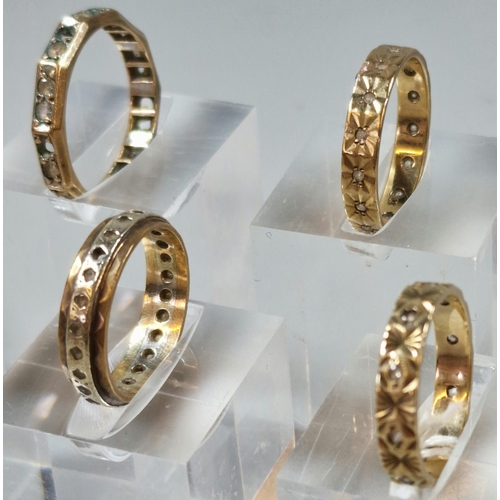 254 - Collection of four 9ct gold full eternity style rings. 10.5g approx. Sizes N, Q, S and M. (4)  (B.P.... 