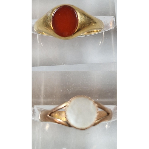 256 - 18ct gold signet ring. 3.1g approx. Size N. Together with a 9ct gold and mother of pearl dress ring.... 