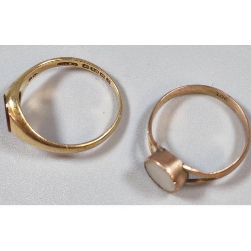 256 - 18ct gold signet ring. 3.1g approx. Size N. Together with a 9ct gold and mother of pearl dress ring.... 