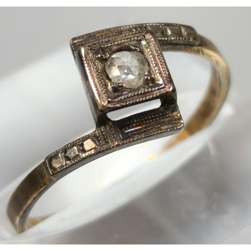 259 - 18ct gold diamond ring. 1.6g approx. Size O.  (B.P. 21% + VAT)