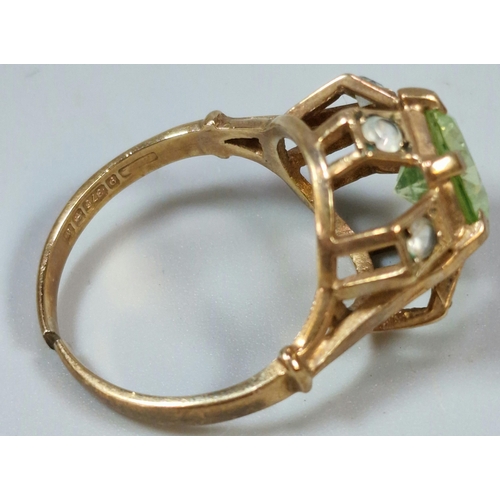 263 - 9ct gold multi cluster clear stone ring with central green stone. 3.5g approx. Size L.  (B.P. 21% + ... 