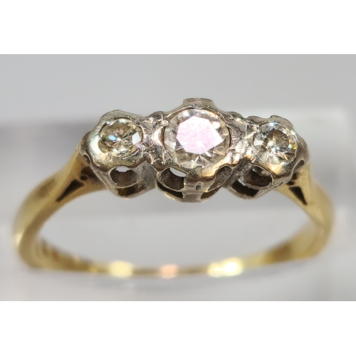 264 - 9ct gold and platinum diamond three stone ring. 2.7g approx. Size K1/2.  (B.P. 21% + VAT)