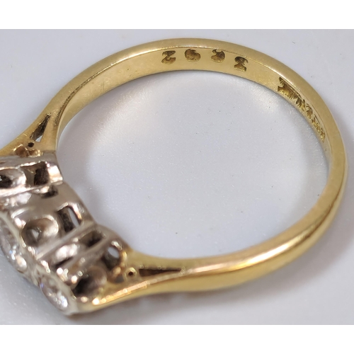 264 - 9ct gold and platinum diamond three stone ring. 2.7g approx. Size K1/2.  (B.P. 21% + VAT)