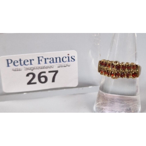 267 - 9ct gold and garnet cluster ring. 4.3g approx. Size O.  (B.P. 21% + VAT)