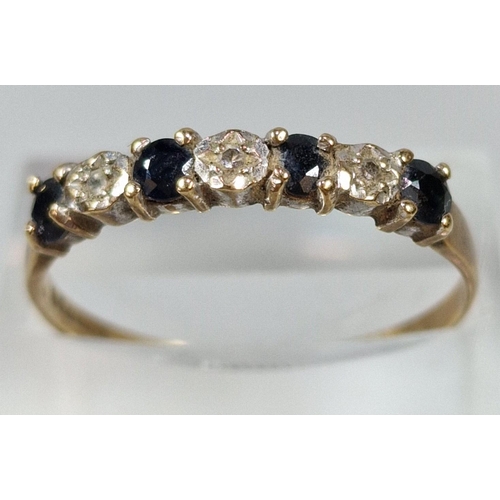 271 - 9ct gold diamond and sapphire seven stone half eternity style ring. 1.6g approx. Size S. (B.P. 21% +... 