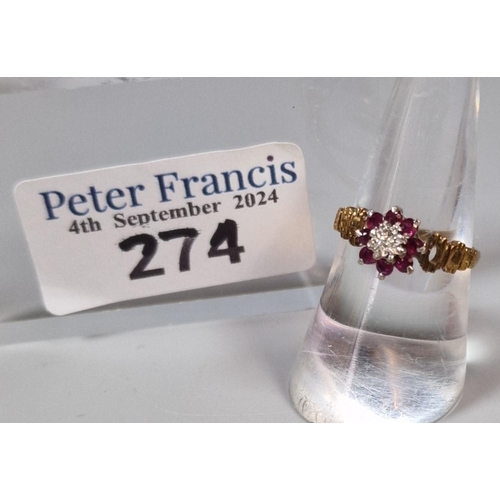 274 - 18ct gold diamond and ruby flower head ring. 3g approx. Size N. (B.P. 21% + VAT)