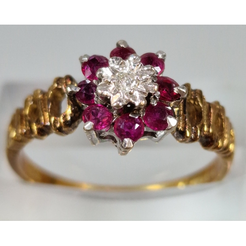 274 - 18ct gold diamond and ruby flower head ring. 3g approx. Size N. (B.P. 21% + VAT)