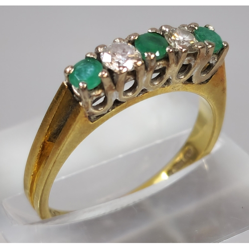 276 - 18ct gold diamond and emerald five stone ring. 3.5g approx. Size M1/2. (B.P. 21% + VAT)