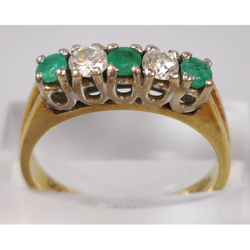 276 - 18ct gold diamond and emerald five stone ring. 3.5g approx. Size M1/2. (B.P. 21% + VAT)