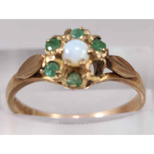 277 - 9ct gold opal and green stone flowerhead ring (missing one stone). 1.7g approx. Size M. (B.P. 21% + ... 