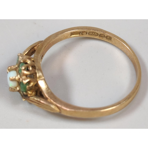 277 - 9ct gold opal and green stone flowerhead ring (missing one stone). 1.7g approx. Size M. (B.P. 21% + ... 