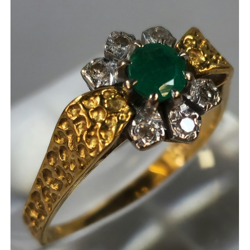 280 - 18ct gold diamond and emerald seven stone flowerhead ring. 3g approx. size M. (B.P. 21% + VAT)