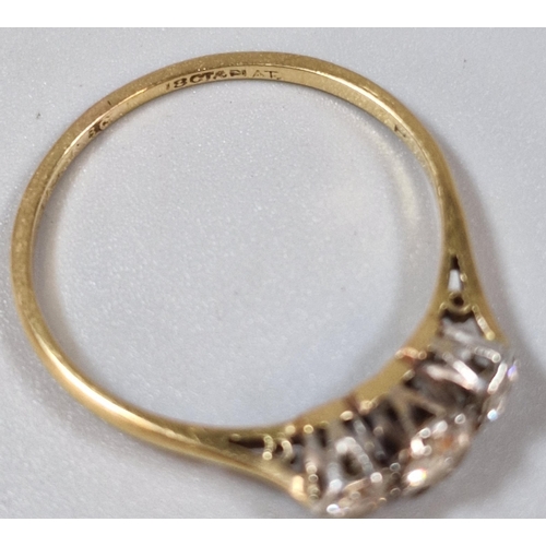 281 - 18ct gold diamond three stone ring. 1.8g approx. Size Q1/2. (B.P. 21% + VAT)