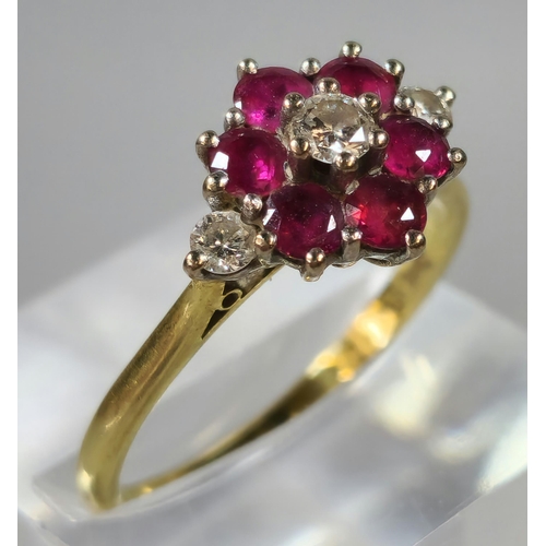 283 - Gold, diamond and ruby flowerhead cluster ring. Rubbed hallmarks. 3.9g approx. Size R. (B.P. 21% + V... 