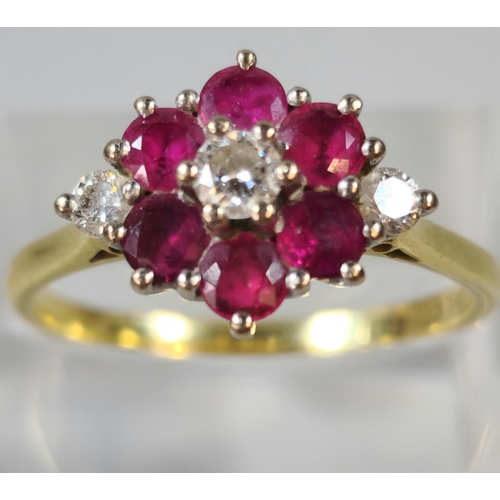 283 - Gold, diamond and ruby flowerhead cluster ring. Rubbed hallmarks. 3.9g approx. Size R. (B.P. 21% + V... 