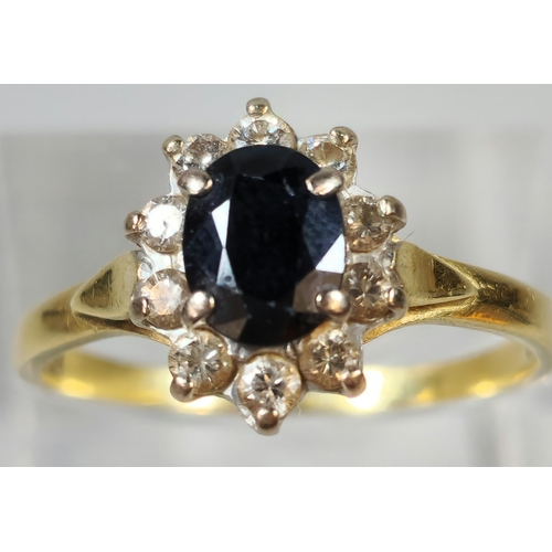 285 - 18ct gold diamond and sapphire cluster ring. 3.5g approx. Size S. (B.P. 21% + VAT)