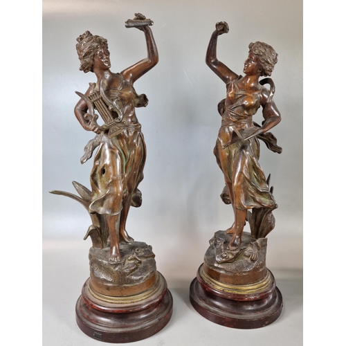 31 - Pair of early 20th century French emblematic spelter figures, one with lyre, having foundry mark 'Ma... 