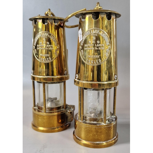 32 - Two brass Miner's lamps, both marked 'The Protector Lamp and Lighting Co. Eccles'. (2) (B.P. 21% + V... 