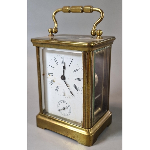 33 - Vintage brass carriage clock with enamel face, Roman numerals and sweep seconds dial. With key. (B.P... 